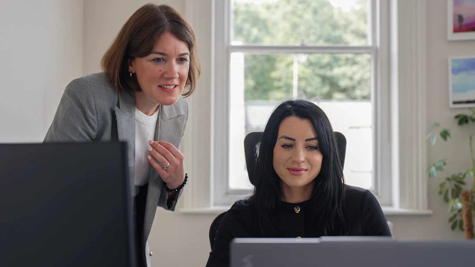 CVG Family Law solicitors reviewing a case together at the office