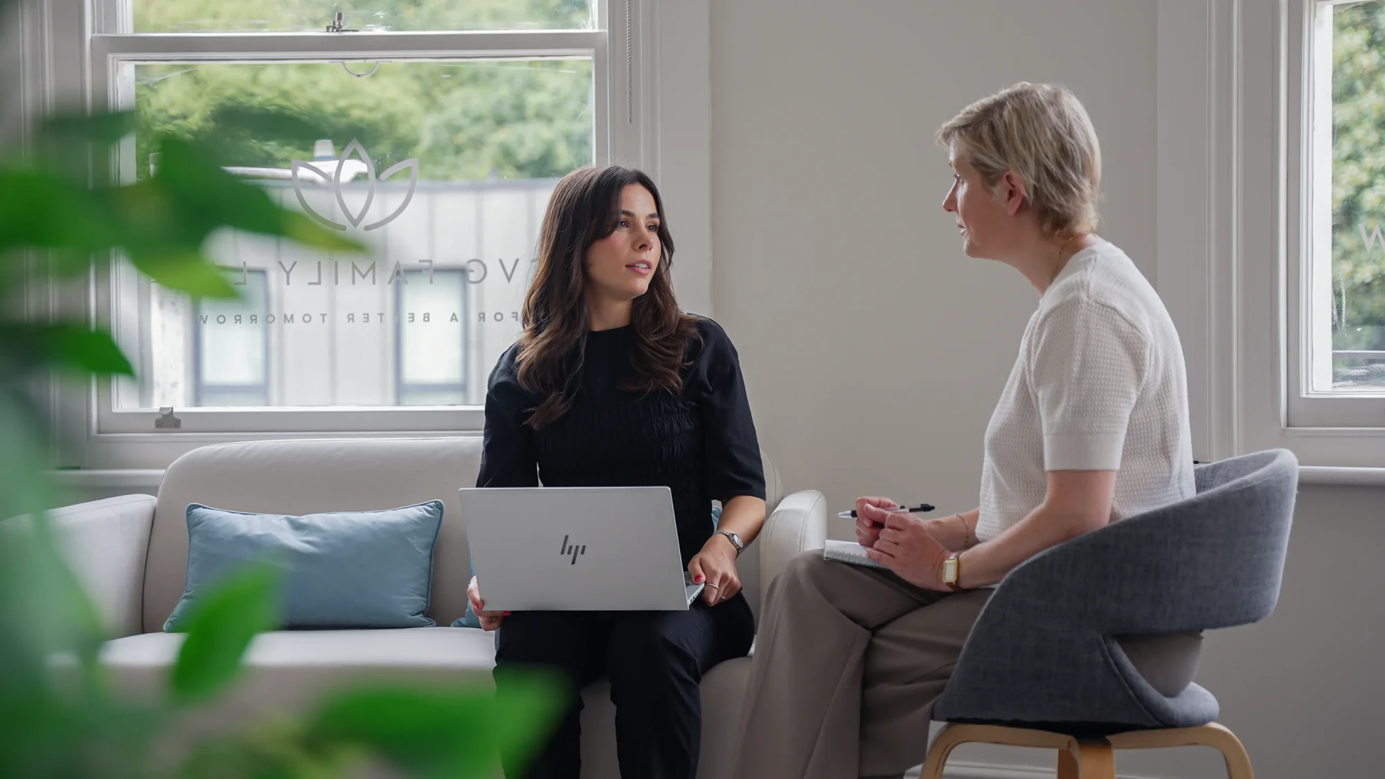 Two CVG Family Law solicitors in conversation at the Tunbridge Wells office